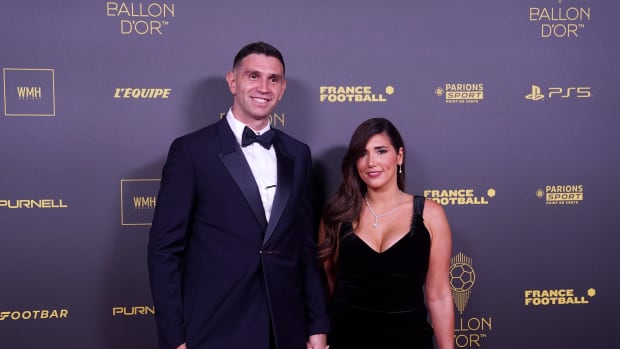 Argentina goalkeeper Emiliano Martinez pictured with his wife Amanda at the 2023 Ballon d'Or awards ceremony in Paris